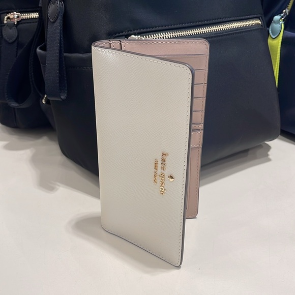 Kate Spade Madison Large Slim Bifold Wallet
Meringue 
NWT - Picture 9 of 16